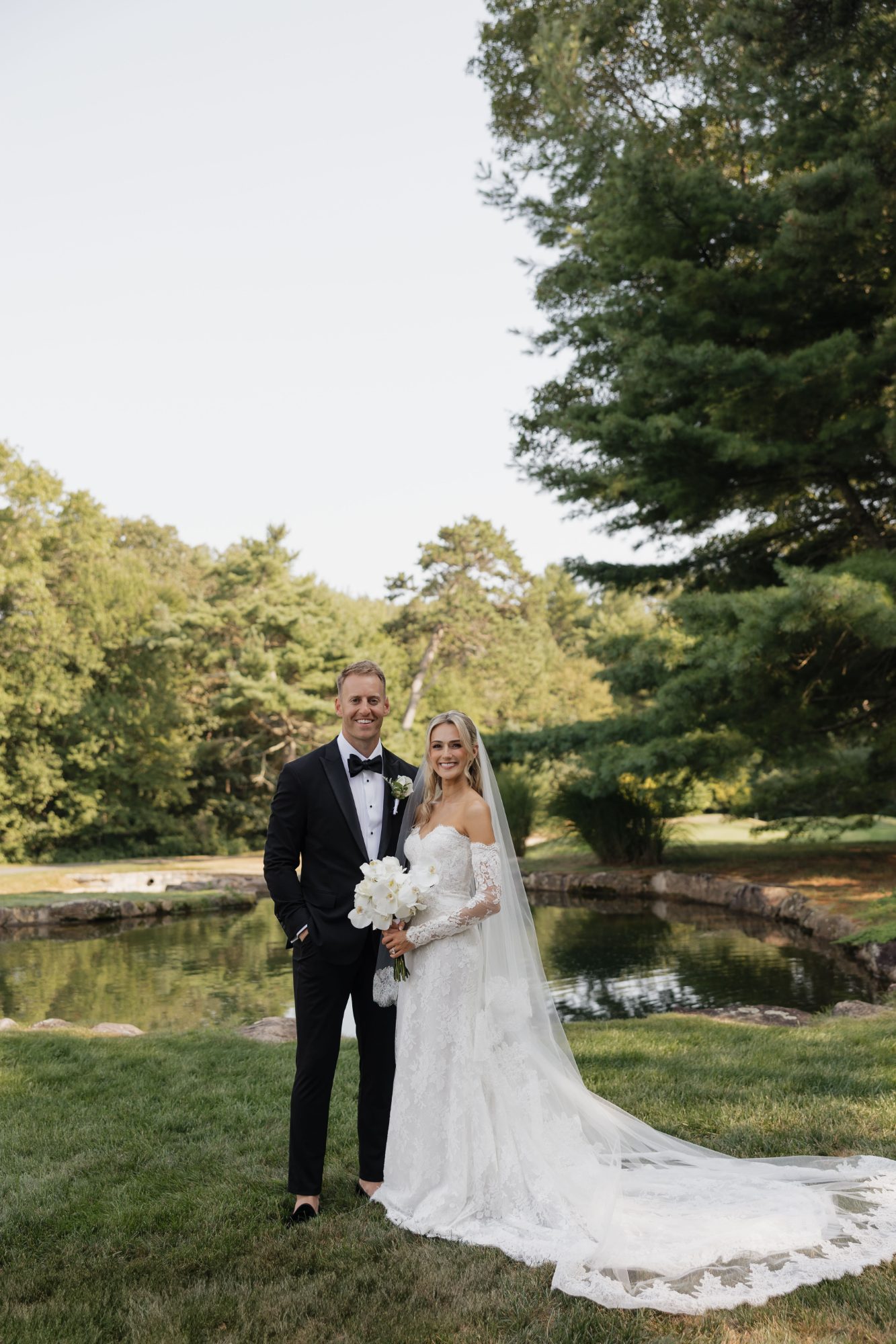 The couple beside the pond